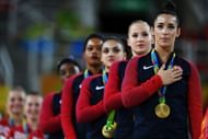 Team USA: Biles, Douglas, Hernandez, Kocian and Raisman (L-R) wins Gold at the Rio games (Photo by Laurence Griffiths/Getty Images)